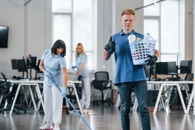 man-holds-basket-group-of-workers-clean-modern-of-2023-11-27-05-36-36-utc-scaled-e1721822570525